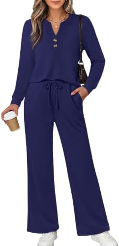 A deep dark blue knit with four-way stretch gives this coordinated top and wide-leg pant set a clean, fluid drape from day to evening.