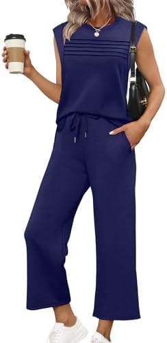 Deep dark blue spacer knit shapes this two-piece set, pairing a pleated cap-sleeve top with relaxed wide-leg cropped pants.