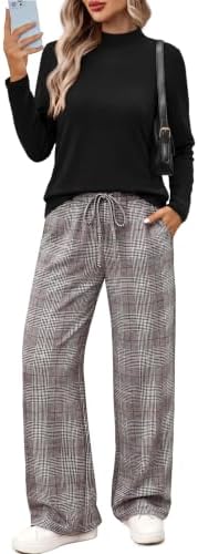 A soft mock neck top meets wide-leg lounge trousers in a muted gray checkered print that travels smoothly without fuss.