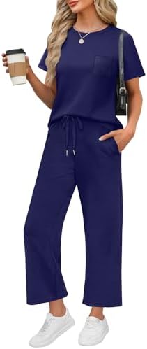 A deep navy blue two-piece set cut from silky spacer knit with a crewneck top and cropped wide-leg pants.