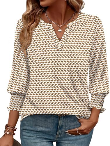 Crisp stripes pattern this soft V neck blouse, cut with three-quarter sleeves and gentle elastic at the cuffs.