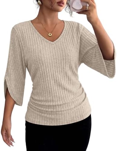 Spun in a soft ribbed knit, this apricot tunic features a deep V-neck and relaxed three-quarter dolman sleeves for warmer workdays.