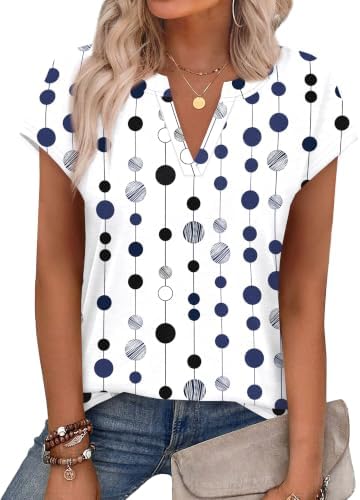 Crisp polka dots bring a graphic touch to this light summer tee, finished with cap sleeves and an open notched neckline.