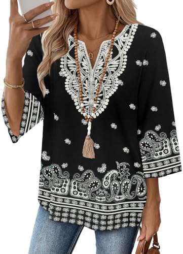 Intricate ivory patterning stands out against a deep black base on this lightweight tunic top with delicate lace along the front neck.