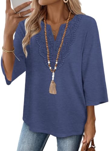 A soft knit tunic in denim blue, detailed with front lace trim and three-quarter sleeves that make everyday dressing easy.