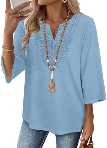 Delicate lace accents and a gentle light blue shade make this three-quarter sleeve top an easy match for white denim or work slacks.