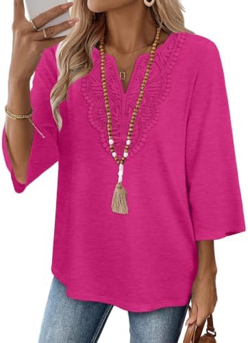 A soft blush pink knit with three-quarter sleeves and a delicate lace inset across the front panel.