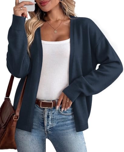 Deep navy knit with contrasting striped cuffs creates a lightweight open layer for breezy days and cold indoor spaces.