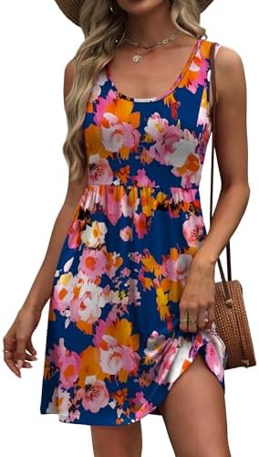 A deep navy backdrop sets off pink botanical blooms on this lightweight sleeveless sundress with built-in side pockets.