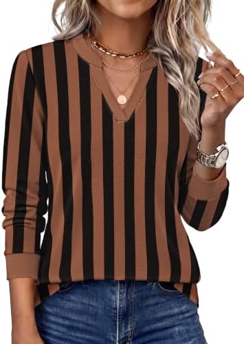 Even horizontal stripes of chocolate brown and deep black give this long-sleeve knit top a warm, grounded look for cooler days.