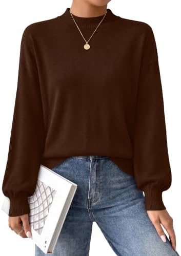 A rich chocolate brown mock neck knit with soft puff sleeves, cut relaxed through the body for cool autumn days and evenings.