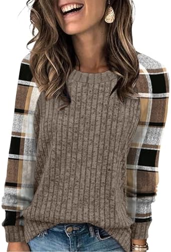 Soft khaki plaid panels meet a relaxed round neck in this lightweight sweater designed for cool days and easy travel.