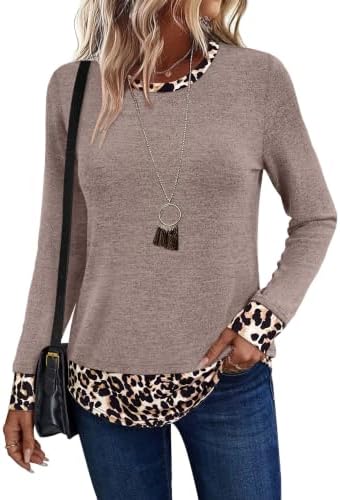 Warm khaki knit meets a bold leopard print hem band on this relaxed crewneck tunic made for easy layering.