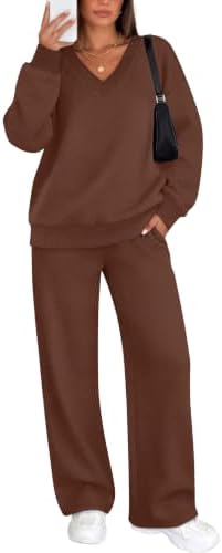 Rich chocolate brown knit brings warm depth to this relaxed two-piece set, cut with a ribbed V-neck top and wide-leg pants.