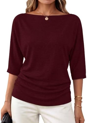 A wide boat neck and fluid batwing sleeves give this lightweight purplewine knit top an easy drape for cool evenings.