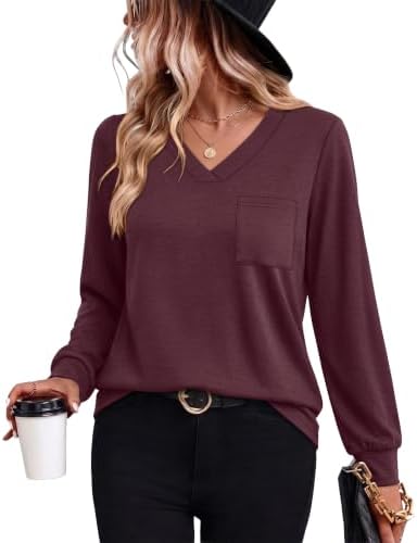 Deep wine red knit brings a rich holiday tone to this relaxed V-neck tunic cut with full long sleeves.