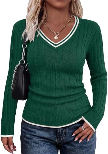 Crisp white tipping frames the rich green knit of this long-sleeve sweater, tailored close to the body for cool-weather layering.