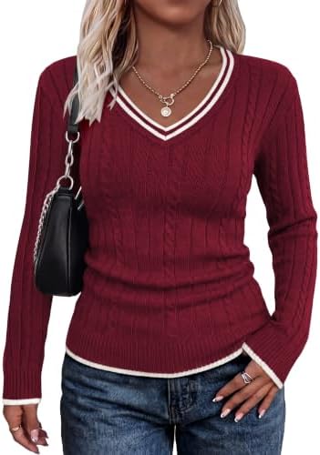 Deep wine red meets crisp white contrast tipping along the neck, cuffs, and hem in a texture-rich vertical cable knit.