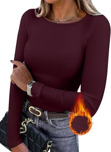 A deep wine rayon knit lined with light fleece, this crewneck tunic hugs close to hold heat on crisp fall days and cool nights.