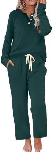 Cut in a rich dark green knit, this two-piece lounge set pairs a long sleeve henley top with pocketed wide leg pants.