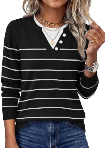 A crisp striped black knit sweater cut with dropped shoulders and a contrast collar that builds a clean faux-layered look.