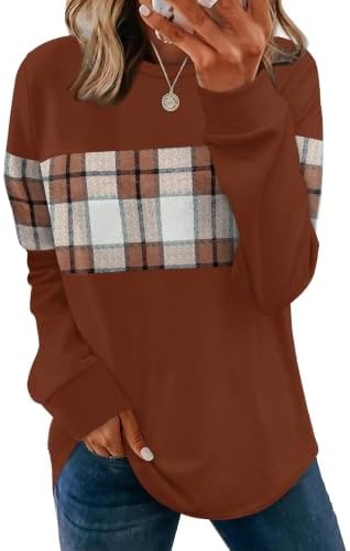 Bold checkered sleeves meet a solid body on this lightweight tunic cut with a curved hem and side vents.