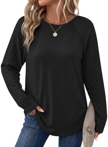 Ribbed textured raglan sleeves give this lightweight dark black pullover clean contrast and gentle coverage.