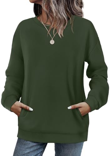 Cut in a lush green stretch knit, this crewneck tunic features dropped shoulders and a subtle hidden side pocket.