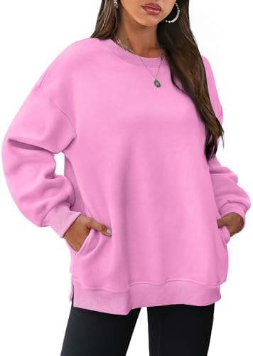 A soft pink fleece pullover cut loose with side slits and hidden pockets for cool summer evenings and breezy mornings.