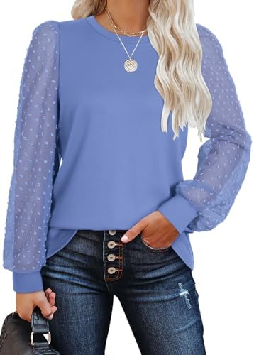 Sheer swiss dot puff sleeves give this light blue crewneck tunic an airy feel that pairs neatly with white denim.