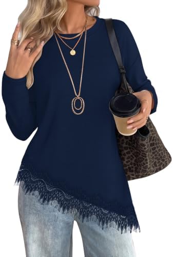 A soft blue long-sleeve knit finished with an asymmetrical curved hem and delicate lace trim along the edge.