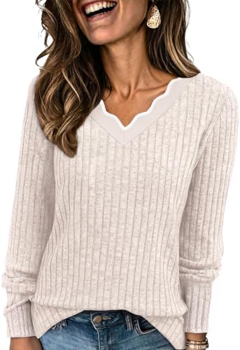 A scalloped neckline and warm apricot tone make this lightweight knit pullover an easy choice for office hours and weekend plans.