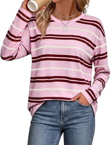 Horizontal stripes of pink, white, and earthy brown bring a retro look to this relaxed drop-shoulder long sleeve top.