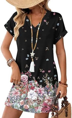 A relaxed t-shirt sundress in black ditsy floral, cut with a gentle v-neck, cuffed short sleeves, and hidden side pockets.