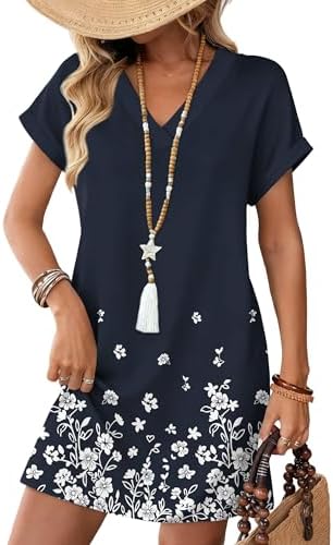 A deep navy backdrop covered in leafy floral blooms gives this easy v-neck t-shirt dress a relaxed feel.