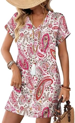 A relaxed t-shirt sundress patterned in pink paisley, cut with a subtle v-neck, cuffed short sleeves, and deep side pockets.