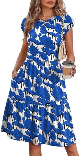 Gentle blue lotus blooms cover this breezy tiered sundress, cut with neat cap sleeves and deep side pockets for warm afternoons.