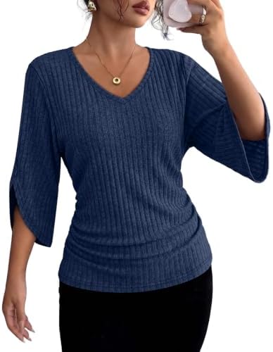 A deep V-neckline leads into a fluid ribbed knit tunic finished in a rich, saturated deepblue shade that holds up through weekly wear.