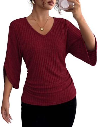 A deep red ribbed knit tunic cut with a deep V-neckline and roomy three-quarter flare sleeves for cool evenings.