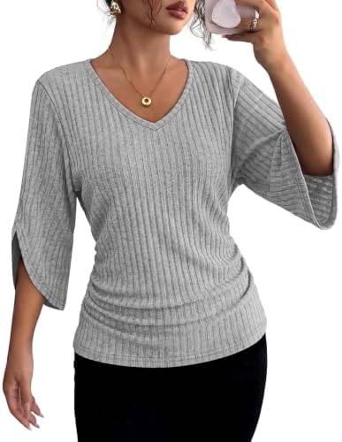 Heather grey ribbed knit shapes this easy tunic top, designed with loose three-quarter sleeves and a clean V-neckline.
