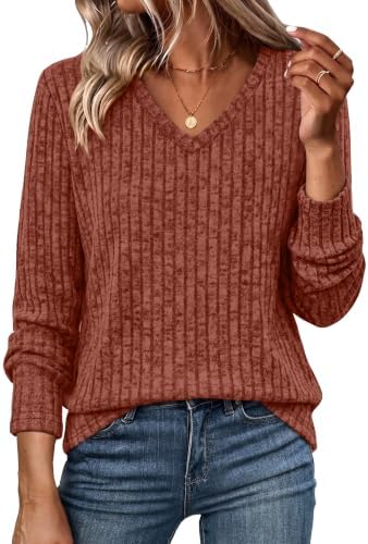 Caramel knit brings warm, earthy tones to this soft ribbed V-neck tunic cut with an easy drape for crisp evenings.