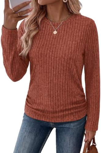 Gathers along both side seams add soft texture to this crewneck tunic, cut in a lightweight ribbed knit in caramel red.
