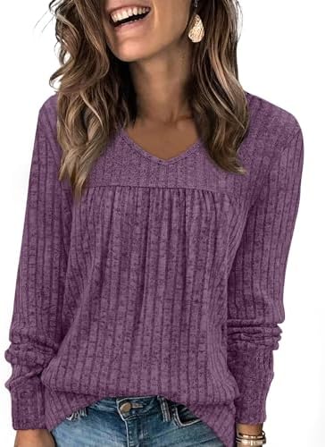 A gentle V-neckline leads into front pleats on this rich purple ribbed knit, cut long enough to pair over leggings.