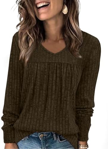 A deep dark brown knit with fine vertical ribbing and gentle front pleats brings easy warmth to cool morning routines.