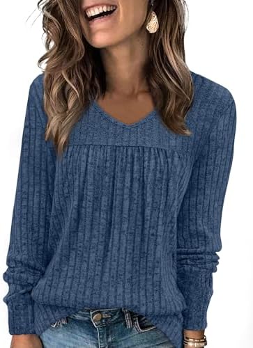 A cool blue long sleeve top knit with vertical ribbing, gentle front pleats, and a classic V-neckline.