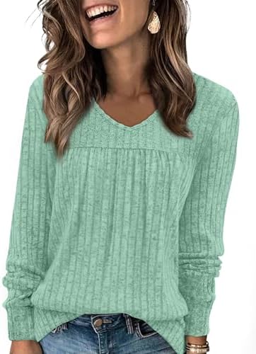Soft ribbed knit in muted sage green pairs an open V-neckline with gentle front pleats for cool mornings and layered days.