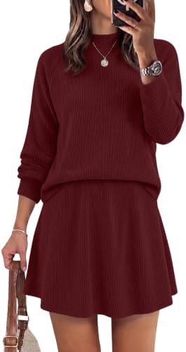 A deep purplish red knit pairs a mock neck top with an A-line mini skirt for easy packing and late summer layering.