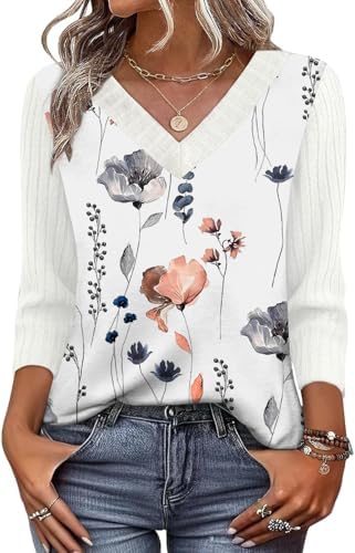 Three-quarter sleeves and a neat V-neckline define this soft floral top in Print 02, tailored for everyday wear.