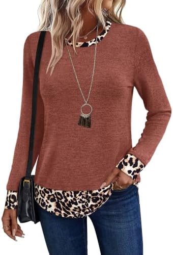 Warm caramel knit joins a contrast leopard hem on this soft long sleeve sweater cut for easy fall layering.