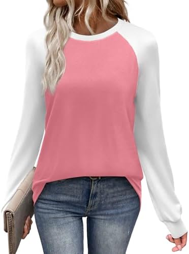 Warm coral pink contrasts across raglan sleeves on this easy long-sleeve knit, sized small through XXL for relaxed layering.